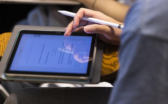 Person working on a tablet.